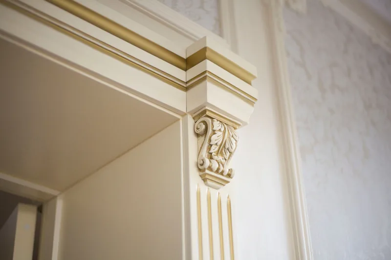 Crown molding scribed to a tall ceiling