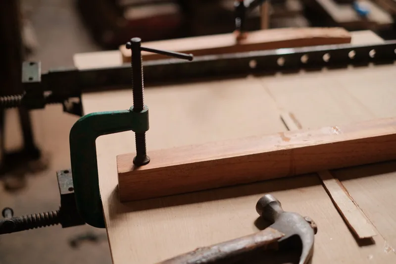 A dado joint cut for a fixed shelf