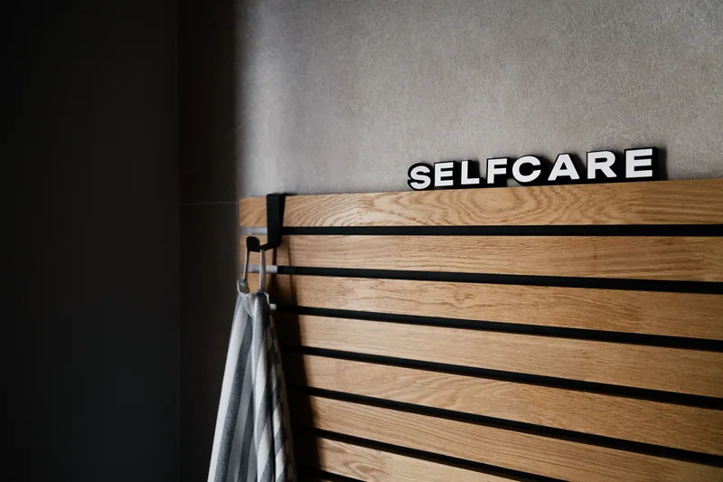 A shiplap back panel behind open shelving