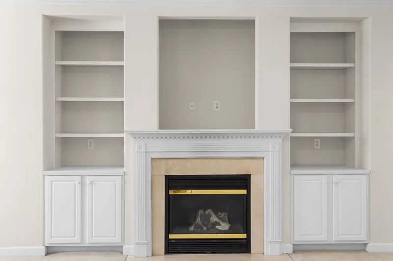 A chimney-breast alcove measured for shelving