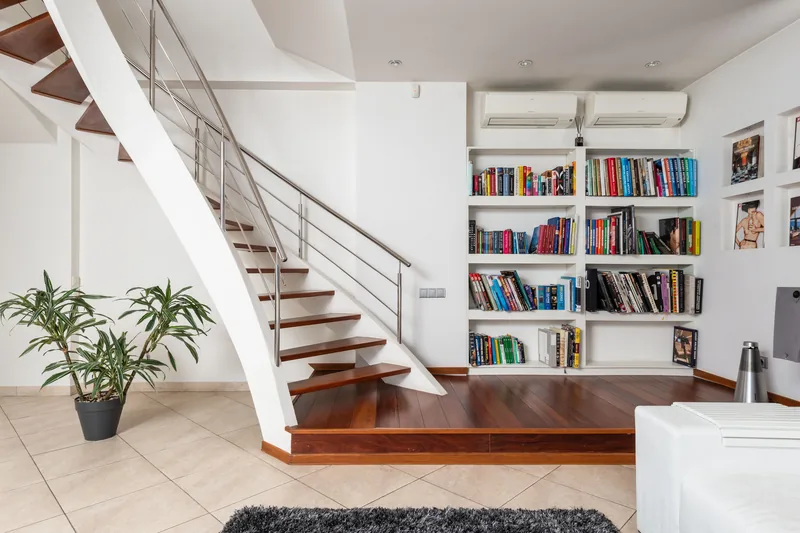 A tall cabinetry span in a two-story room